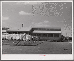 Utility building at Osceola migratory labor camp. Belle Glade, Florida.