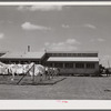Utility building at Osceola migratory labor camp. Belle Glade, Florida.