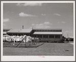 Utility building at Osceola migratory labor camp. Belle Glade, Florida.