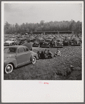 Spectators picnicking before the Point to Point Cup race of the Maryland Hunt Club. Worthington Valley, near Glyndon, Maryland.