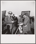 Bookies taking bets at horse races. Warrenton, Virginia.