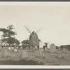 Burial Ground.  Thomas Gardiner's windmill in background. East side Main Street, south of street leading to Maidstone Inn. East Hampton, East Hampton