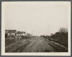 View. Travel Radio station on right. Indian Wells Hollow Road running parallel with shore at Amagansett, looking east to eastern road to beach. Amagansett, East Hampton