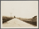 View. Road leading from Montauk Railroad Station around Fort Pond to Hither Plains. Montauk, East Hampton