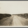 View of road west of Hither Plain Life Savings Station. Between first and second house looking west. Montauk, East Hampton