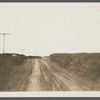 View of road west of Hither Plain Life Savings Station. Between first and second house looking west. Montauk, East Hampton