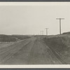 View of Montauk Road looking east to Hither Plain, one mile west of Life Savings Station. Montauk, East Hampton