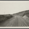 View of Montauk Road looking east to Hither Plain, one mile west of Life Savings Station. Montauk, East Hampton