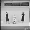 Unidentified women, possibly Franklin Simon employees, with Christmas tree