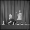 Unidentified man with miniatures