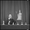 Unidentified man with miniatures
