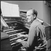 Unidentified man playing organ