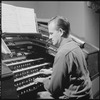 Unidentified man playing organ