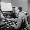 Unidentified man playing organ