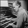 Unidentified man playing organ