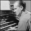 Unidentified man playing organ