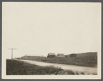 Parsons Garage. Red schoolhouse In background. Closed 1917. Montauk, East Hampton