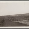 View of road looking west from Ditch Plains Life Savings Station. Montauk, East Hampton