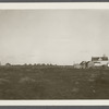 Dickerson Farmhouse (left). Next is Andrews House (center), Montauk Association Houses, Ditch Plains Life Savings Station on right looking east. Montauk, East Hampton