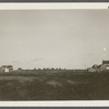 Dickerson Farmhouse (left). Next is Andrews House (center), Montauk Association Houses, Ditch Plains Life Savings Station on right looking east. Montauk, East Hampton