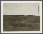 View of ground torn up for a road west of Great Pond on north side of Montauk Highway. Montauk, East Hampton
