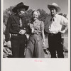 Spear's Siding, Wyola, Montana. Lyman Brewster of Quarter Circle U Ranch with Sally Rand and her father, Turk Greenough, at a stockmen's picnic and barbecue.