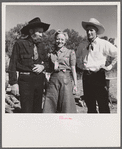 Spear's Siding, Wyola, Montana. Lyman Brewster of Quarter Circle U Ranch with Sally Rand and her father, Turk Greenough, at a stockmen's picnic and barbecue.