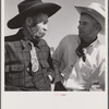 Lyman Brewster of Quarter Circle U Ranch with Turk Greenough's father (Sally Rand's father-in-law) at a stockmen's picnic and barbecue. Spear's Siding, Wyola, Montana.