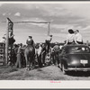 Ashland, Montana. Cowboys and spectators at the annual rodeo.