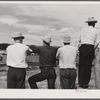 Cowboys and spectators at Ashland rodeo, Montana.