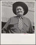 Stockman on street corner. Sheridan, Wyoming.