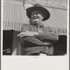 Stockman on street corner. Sheridan, Wyoming.