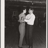 Dude dancing with cowhand on Saturday night in Birney, Montana.