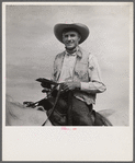 Lyman Brewster of Quarter Circle U. Ranch at annual rodeo, Ashland, Montana.
