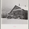 Ranch house after early fall blizzard in mountains near Aspen, Colorado.