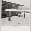 Ranch house after early fall blizzard in mountains near Aspen, Colorado.