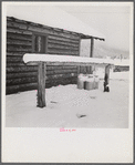 Ranch house after early fall blizzard in mountains near Aspen, Colorado.