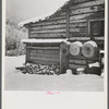 Ranch house after early fall blizzard in mountains near Aspen, Colorado.