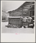 Ranch house after early fall blizzard in mountains near Aspen, Colorado.