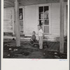 Children of family now living in old hotel in ghost mining town now coming to life because of defense needs. Montezuma, Colorado.