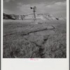 Cattle paths to water hole by windmill on grazing land near Scottsbluff, Nebraska. North Platte River Valley.