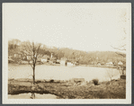 View of Silver Lake ard center of Roslyn with Clock Tower. Cross Village Road. Roslyn, North Hempstead