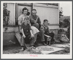 Mr. and Mrs. Harvey Renninger with sons, Winfield and Richard, members of Two River Non-Stock Cooperative, FSA (Farm Security Administration) co-op. Waterloo, Nebraska.