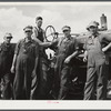 George Leaver, president; Don Shinaut, treasurer; Russell Smith, director; Henry Wollen and Jay Rowell, board of directors of Two River Non-Stock Cooperative, a FSA co-op, looking at demonstration of Farmall "M" Tractor. Waterloo, Nebraska.