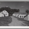 Poultry houses and barn on Two Rivers Non-Stock Cooperative, a FSA (Farm Security Administration) co-op. Waterloo, Nebraska.