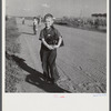 Children coming home from school. Two Rivers Non-Stock Cooperative Company, FSA (Farm Security Administration) co-op. Waterloo, Nebraska.