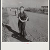Children coming home from school. Two Rivers Non-Stock Cooperative Company, FSA (Farm Security Administration) co-op. Waterloo, Nebraska.