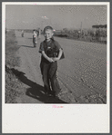 Children coming home from school. Two Rivers Non-Stock Cooperative Company, FSA (Farm Security Administration) co-op. Waterloo, Nebraska.