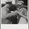 Henry Harringer, in charge of purchasing and marketing enterprise, buying oil and supplies. Two Rivers Non-Stock Cooperative Company, FSA (Farm Security Administration) co-op. Waterloo, Nebraska.