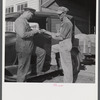 Henry Harringer, in charge of purchasing and marketing enterprise, buying oil and supplies. Two Rivers Non-Stock Cooperative Company, FSA (Farm Security Administration) co-op. Waterloo, Nebraska.